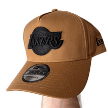 Los Angeles Lakers New Era 9FORTY A-Frame Cap – Wheat – angled front view